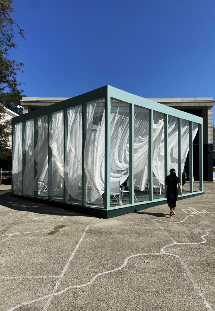 outdoor structure with drapery